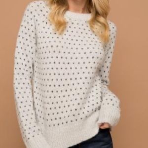 A heart printed minty green sweater